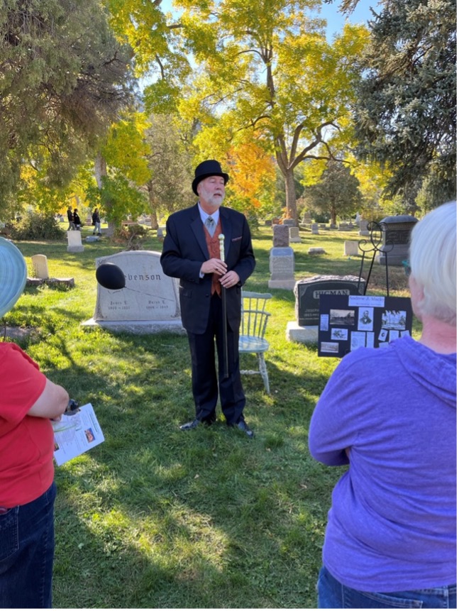 Volunteer Bob Yates portrays Andrew J. Macky, one of Boulder, Colorado’s richest citizens, in Historic Boulder’s Meet the Spirits (2022), as an example of cemetery performance. His accompanying “storyboard” can be seen at right. Photograph courtesy of Heather Kelley.